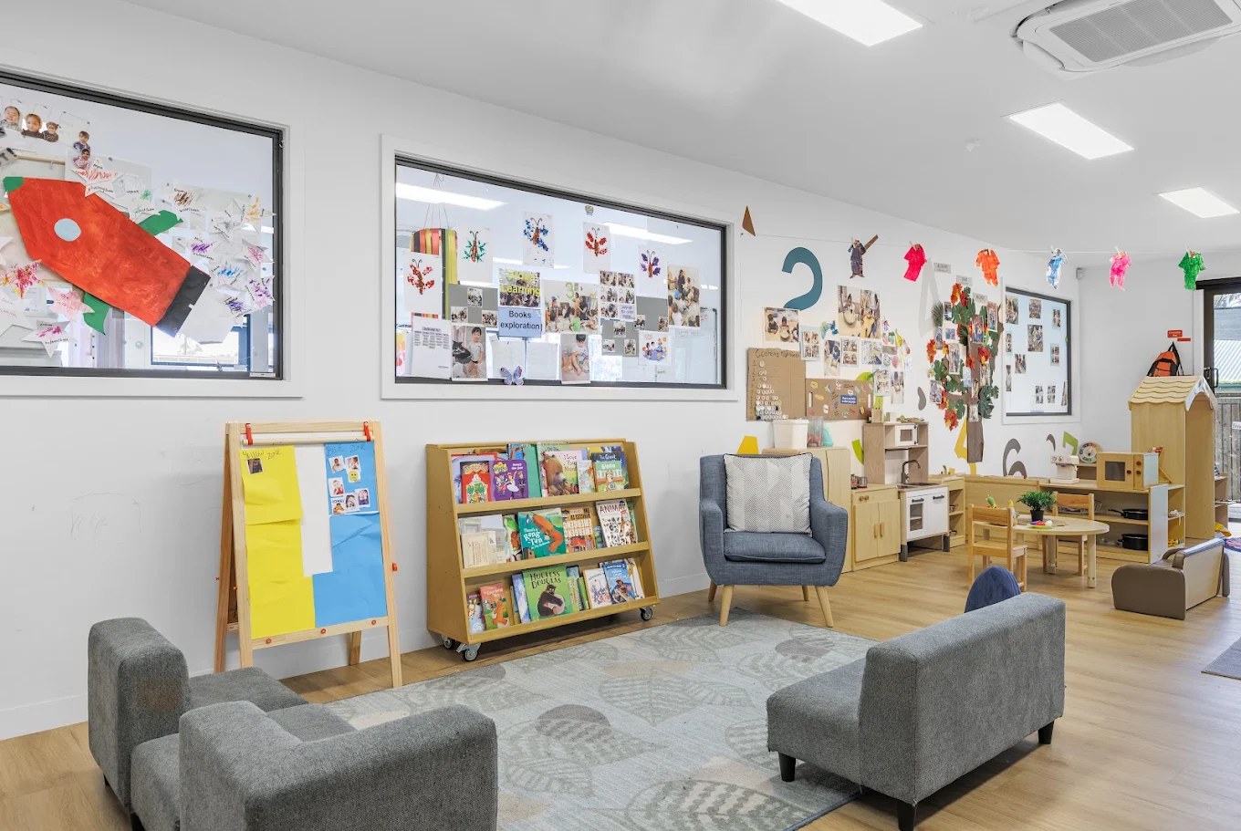 Children playing together in a warm early learning room